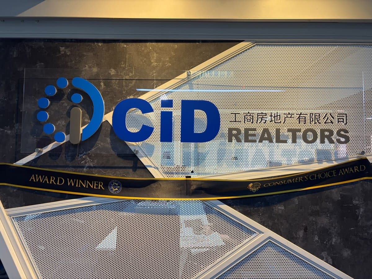 CID Realtors signage inside its office.