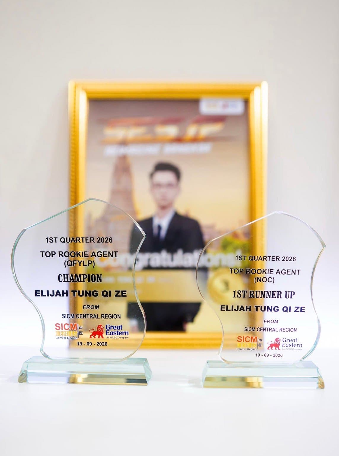 Elijah’s first-quarter 2026 SICM Top Rookie Agent trophies: QFYLP Champion and NOC 1st Runner Up