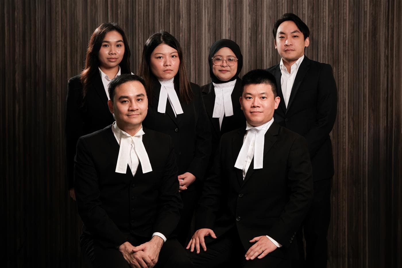 Tan & Khong Chambers legal team in formal court attire